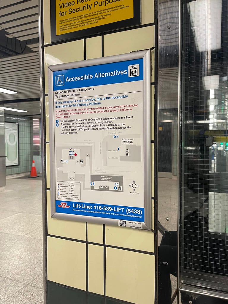 Image of a sign next to the TTC elevator - Accessible Alternatives This elevator is not in service, this is the accessible alternative to the Subway Platform. - Go to the next subway station.
